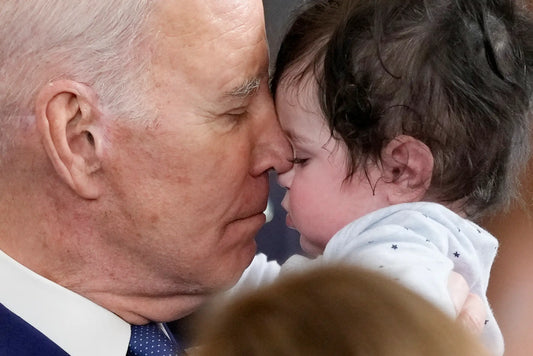 Biden Says He Likes Babies More Than Most People—What Did He Mean?